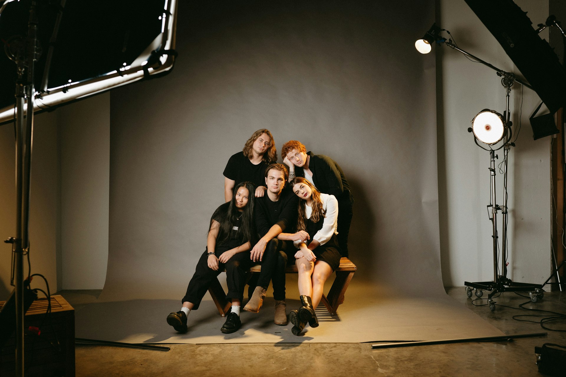 a group of people sitting on a stage